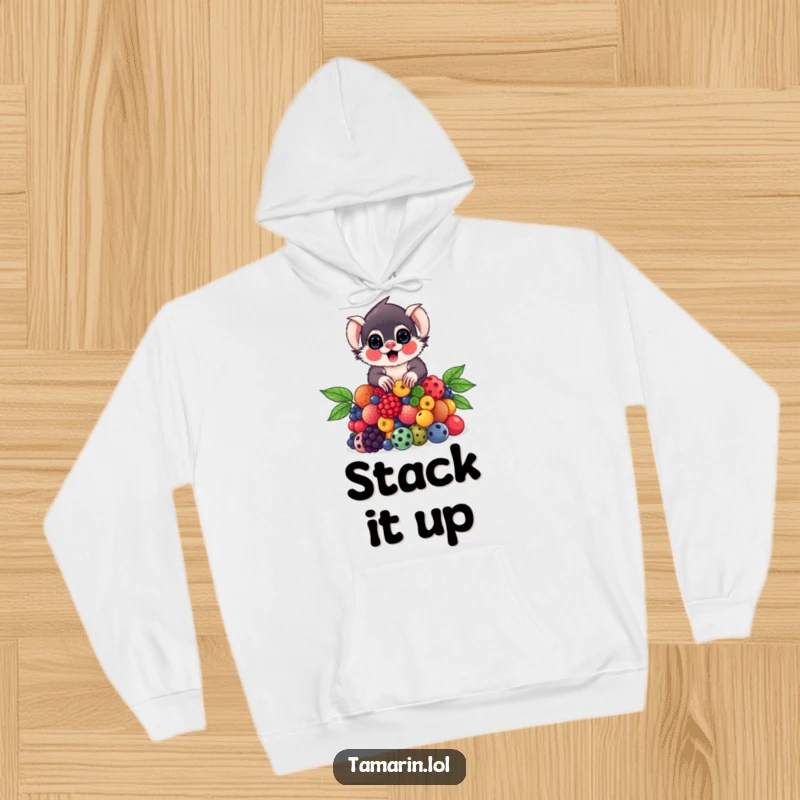 Funny Tamarin Hoodie featuring a tamarin concentrating hard while balancing a large pile of colorful, delicious berries.