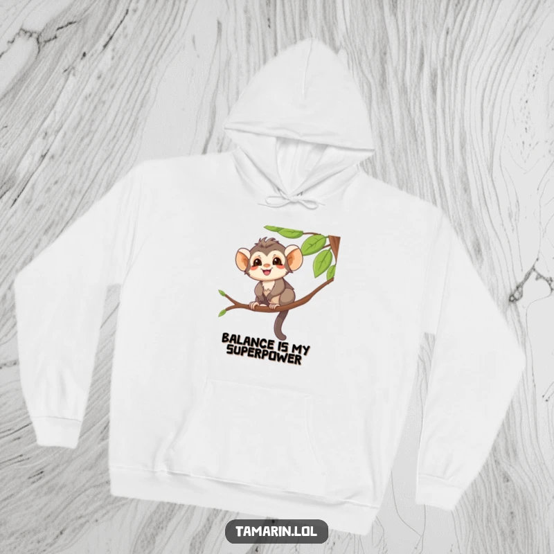 Funny Hoodie featuring a smiling tamarin character balancing on a tree branch, perfect for jungle-themed comfort.