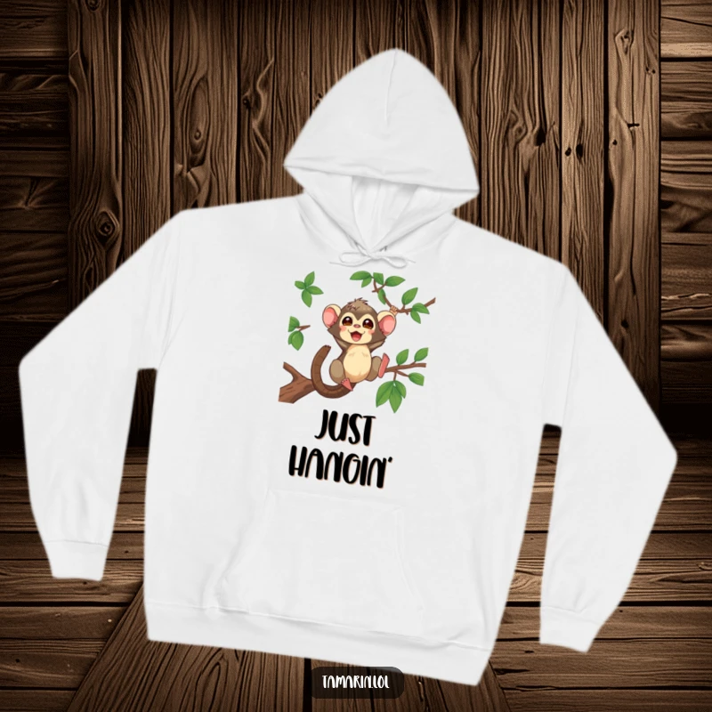 Funny Tamarin Hoodie featuring an excited tamarin mid-swing, its playful energy radiating from the comfortable, warm fabric.