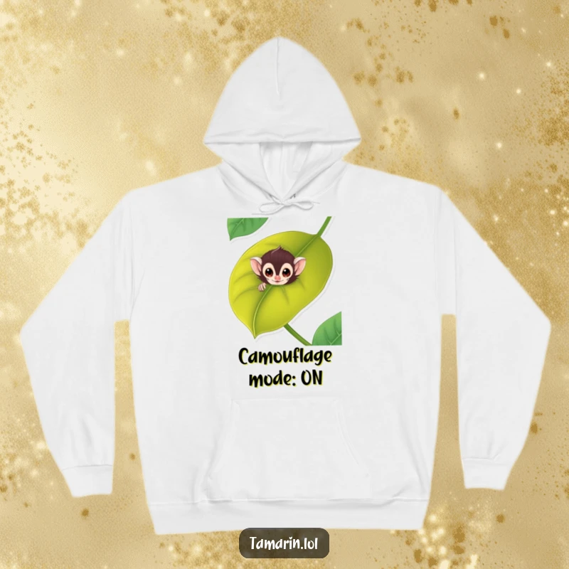 Funny tamarin hoodie features a cute monkey hiding behind a big, vibrant leaf, expressing curiosity and playfulness.