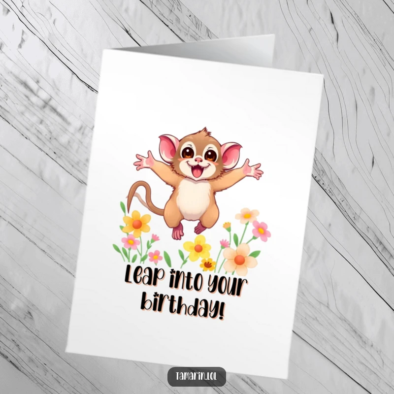 Funny Free Printable Birthday Card: Energetic tamarin leaping with arms wide open through a field of vibrant flowers.