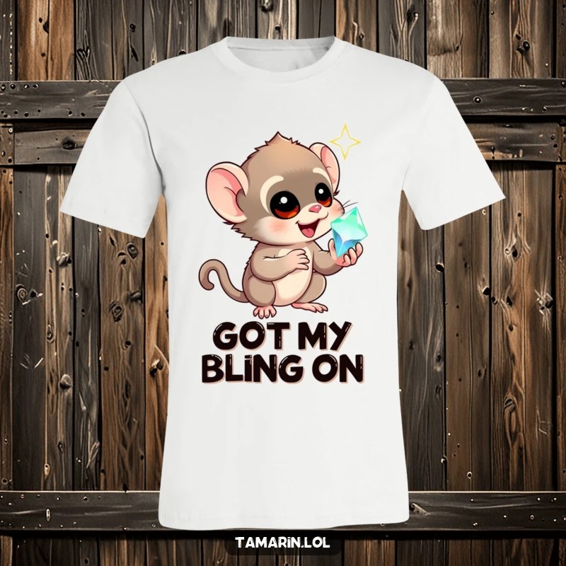 Funny tamarin t-shirt depicting a wide-eyed monkey holding a sparkling gem with utmost awe and delight, a humorous present.