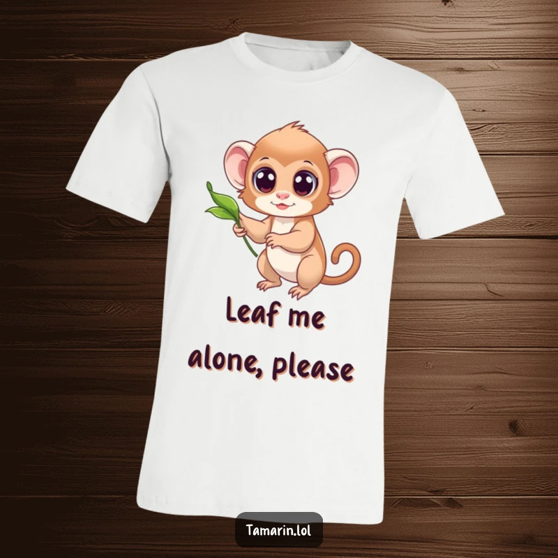 Funny t-shirt showing a tamarin with large, expressive eyes reaching out towards a single, graceful floating leaf.