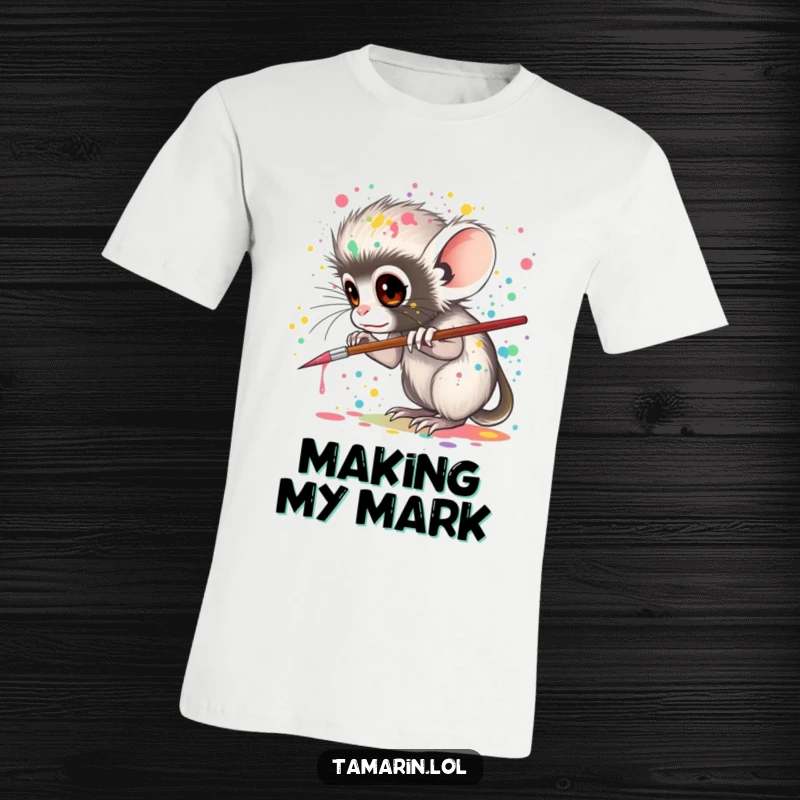 Funny tamarin t-shirt, depicting a tamarin artistically splattering colorful paint from a small brush, celebrating creativity and vibrant expression.